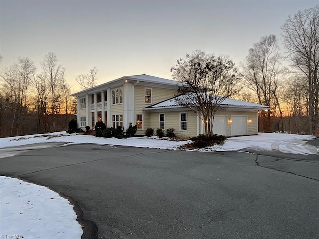 view of front of property featuring a garage