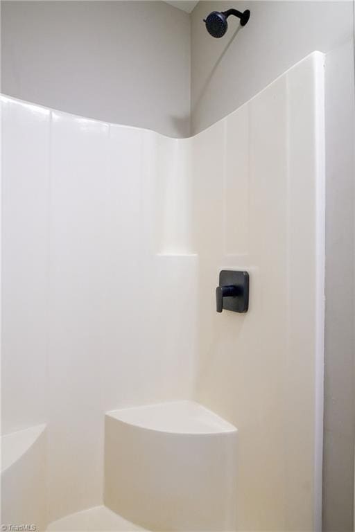 bathroom with walk in shower