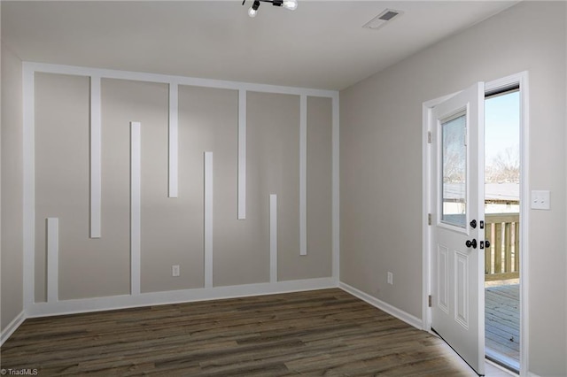 interior space with dark hardwood / wood-style flooring