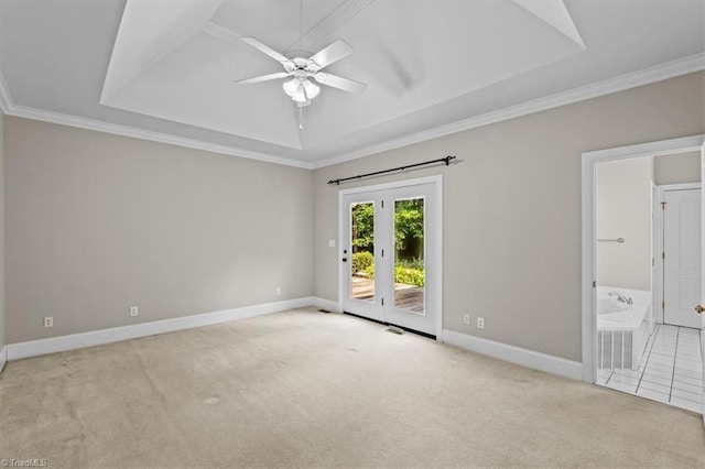 920 James Doak Pkwy, Greensboro, NC 27455 - carpeted empty room with a tray ceiling, ceiling fan, crown molding, and french doors