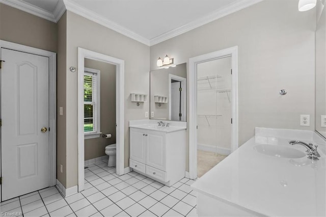 920 James Doak Pkwy, Greensboro, NC 27455 - bathroom with two vanities, crown molding, a walk in closet, and tile patterned floors