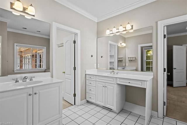 920 James Doak Pkwy, Greensboro, NC 27455 - full bath with two vanities, plenty of natural light, crown molding, and tile patterned floors