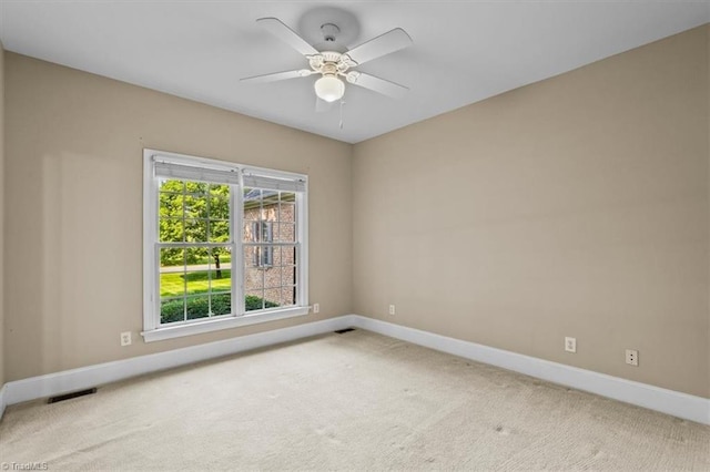 920 James Doak Pkwy, Greensboro, NC 27455 - carpeted spare room featuring baseboards and ceiling fan