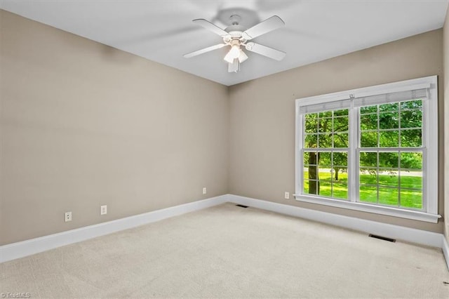 920 James Doak Pkwy, Greensboro, NC 27455 - carpeted spare room featuring baseboards and ceiling fan