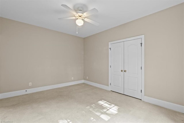 920 James Doak Pkwy, Greensboro, NC 27455 - unfurnished bedroom with light colored carpet, a closet, and ceiling fan