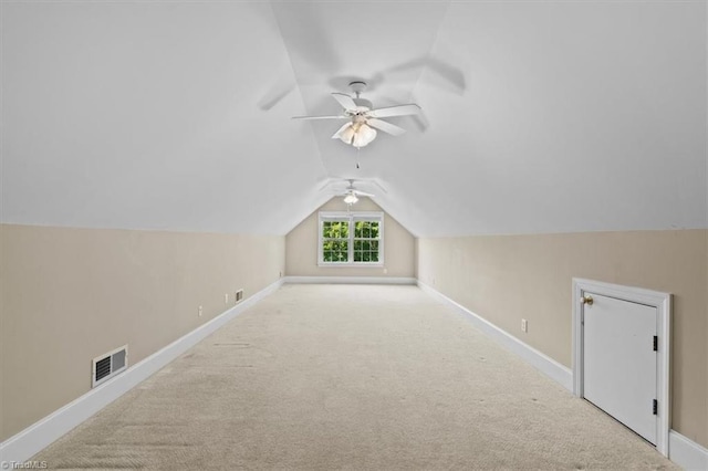 920 James Doak Pkwy, Greensboro, NC 27455 - additional living space with a ceiling fan, lofted ceiling, and carpet floors