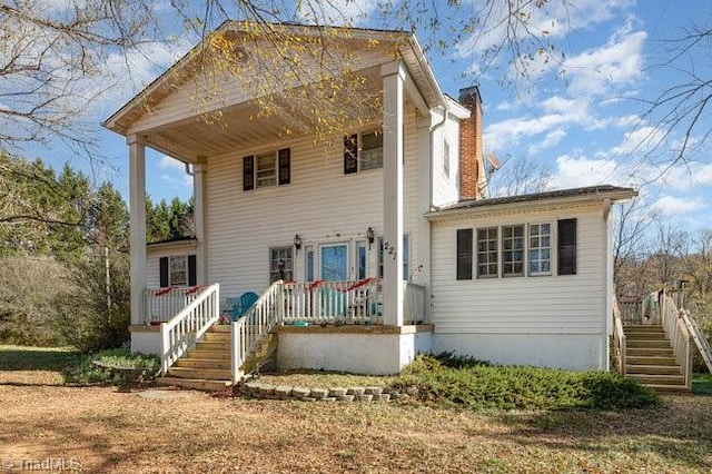 view of front of property featuring covered porch