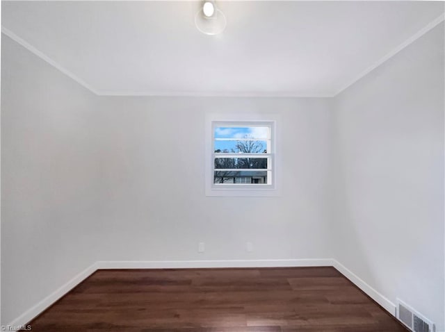 5622 Ruth Ave, Winston-Salem, NC 27105 - spare room with ornamental molding and dark hardwood / wood-style floors