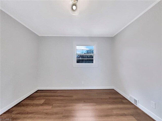 5622 Ruth Ave, Winston-Salem, NC 27105 - unfurnished room with ornamental molding and wood-type flooring