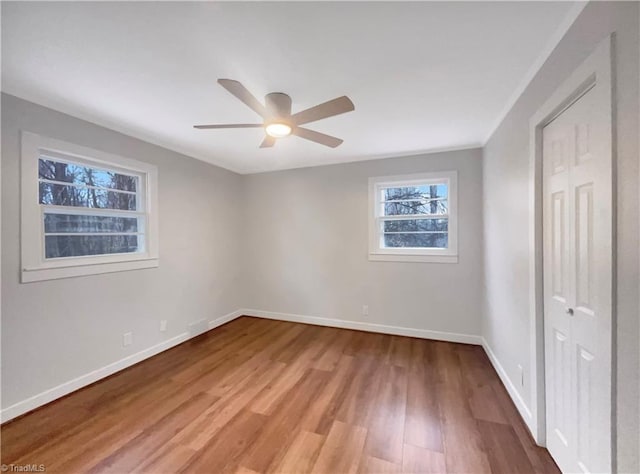 5622 Ruth Ave, Winston-Salem, NC 27105 - unfurnished bedroom with light wood-type flooring, a closet, and ceiling fan