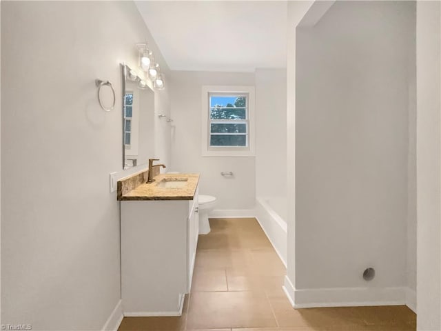 5622 Ruth Ave, Winston-Salem, NC 27105 - bathroom featuring tile patterned floors, toilet, and vanity