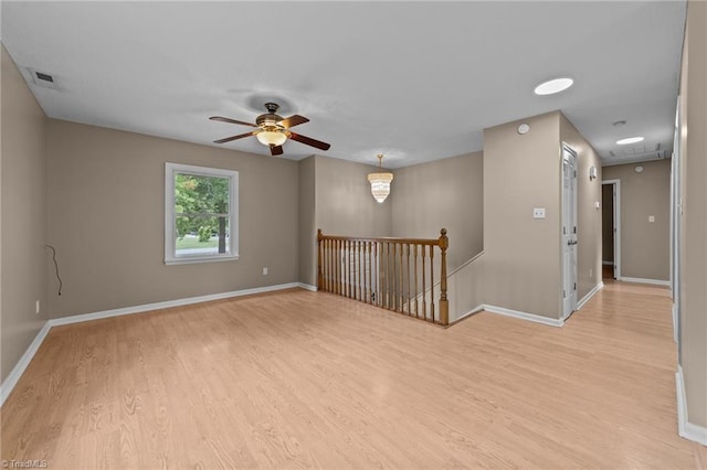 131 Springdale Dr, Stoneville, NC 27048 - unfurnished room featuring baseboards, visible vents, ceiling fan, and light wood finished floors
