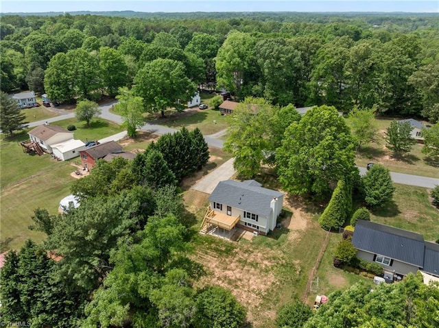131 Springdale Dr, Stoneville, NC 27048 - aerial view featuring a wooded view