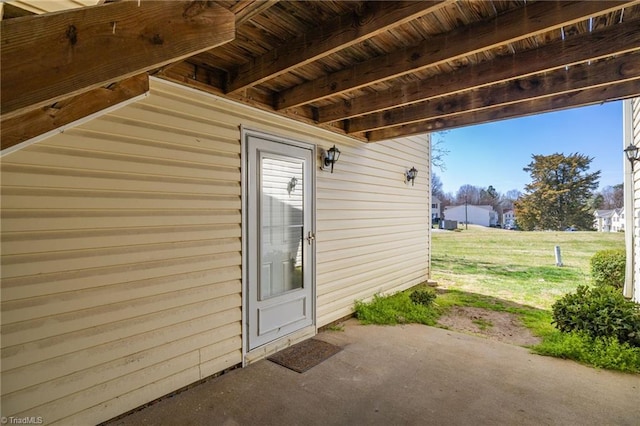 doorway to property featuring a patio area