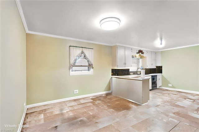 kitchen with ornamental molding, kitchen peninsula, and white cabinets