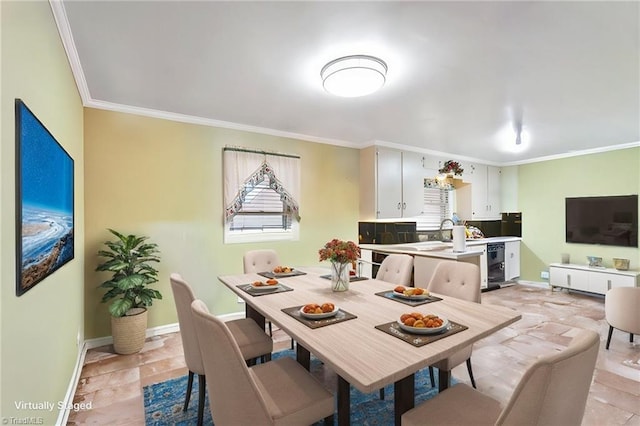 dining room featuring ornamental molding and beverage cooler