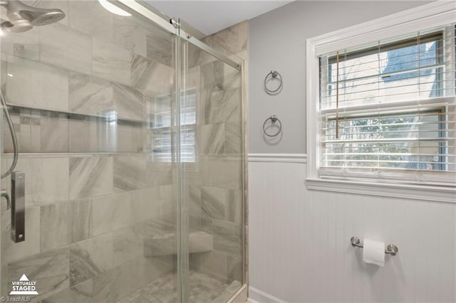 bathroom featuring an enclosed shower