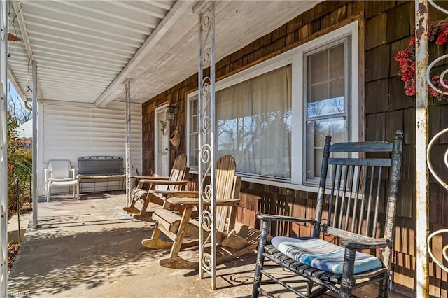 view of patio featuring a porch