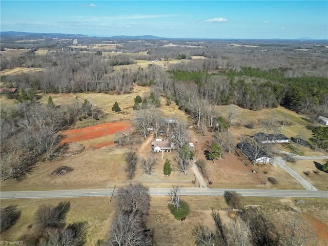 birds eye view of property with a rural view