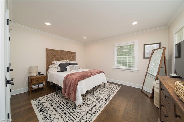 bedroom with crown molding, dark wood finished floors, baseboards, and recessed lighting