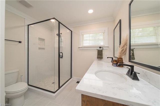 full bathroom featuring toilet, crown molding, a stall shower, double vanity, and tile patterned floors