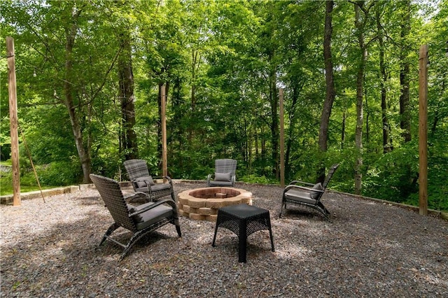 view of patio with a fire pit
