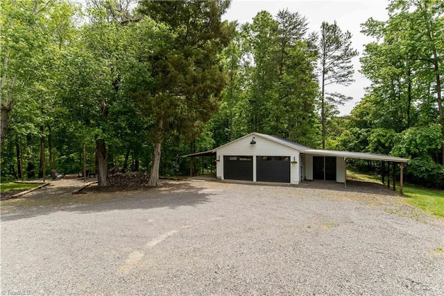garage with view of scattered trees