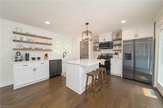 kitchen with open shelves, appliances with stainless steel finishes, dark wood-type flooring, white cabinetry, and light countertops
