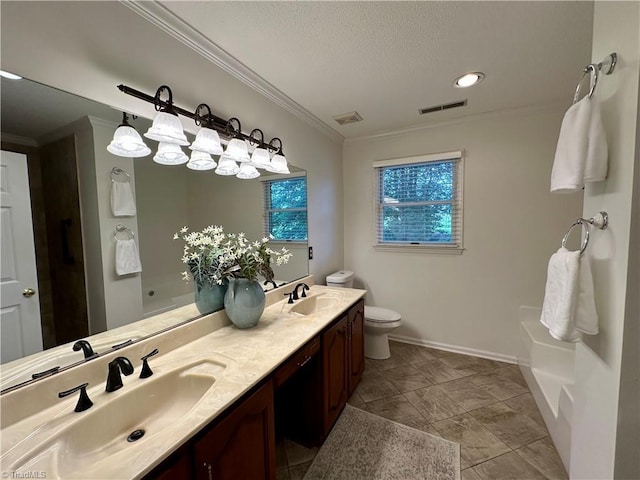 3501 River Ridge Rd, Pfafftown, NC 27040 - bathroom featuring double vanity, crown molding, toilet, baseboards, and a textured ceiling