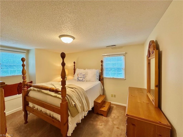 3501 River Ridge Rd, Pfafftown, NC 27040 - carpeted bedroom with a textured ceiling