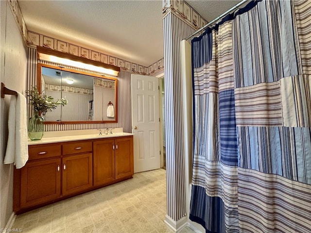 3501 River Ridge Rd, Pfafftown, NC 27040 - bathroom featuring wallpapered walls, a textured ceiling, vanity, and curtained shower
