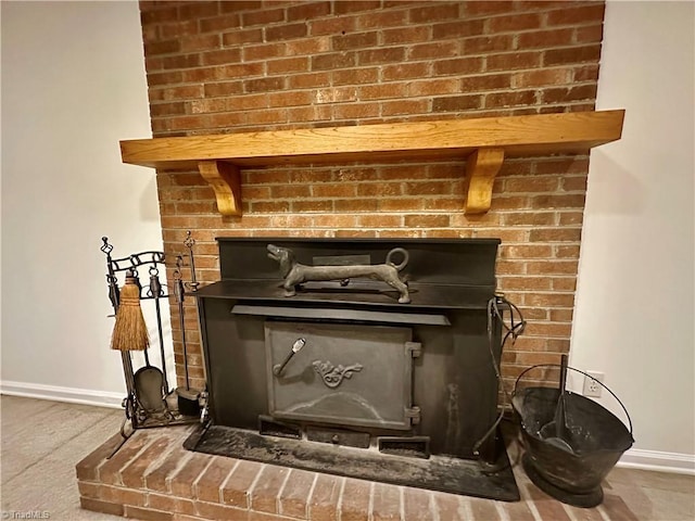 3501 River Ridge Rd, Pfafftown, NC 27040 - detailed view of a fireplace, baseboards, and wood finished floors