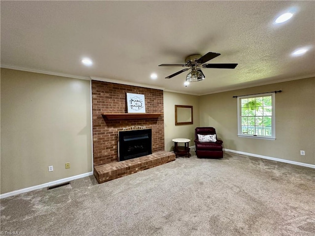 3501 River Ridge Rd, Pfafftown, NC 27040 - living area with a ceiling fan, carpet flooring, recessed lighting, a fireplace, and ornamental molding