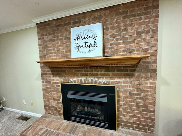 3501 River Ridge Rd, Pfafftown, NC 27040 - detailed view of crown molding, baseboards, carpet flooring, and a fireplace
