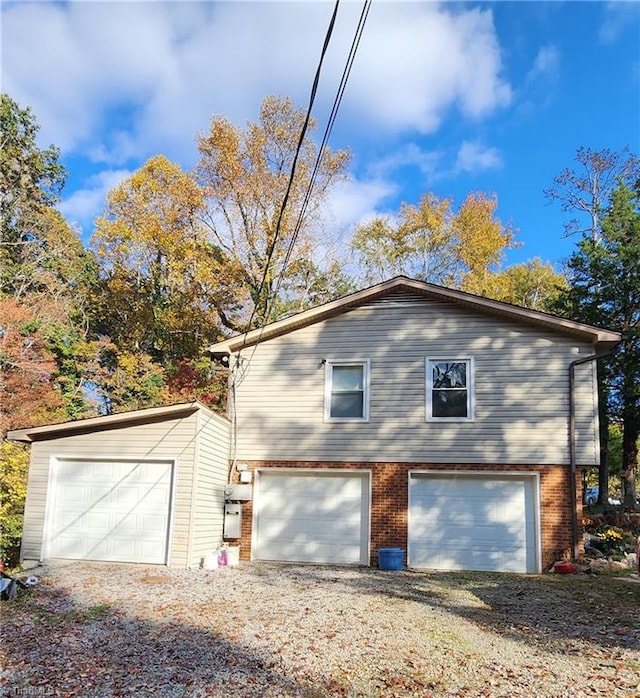 view of home's exterior featuring a garage