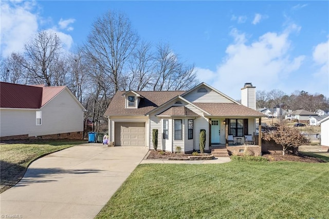 view of front of home with covered porch, a garage, and a front lawn