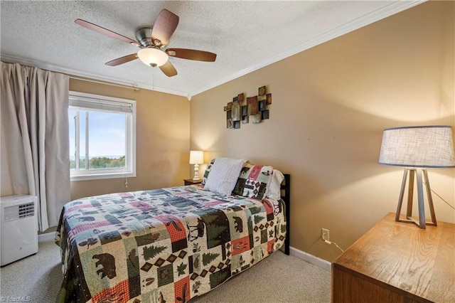 carpeted bedroom with ceiling fan, a textured ceiling, and ornamental molding