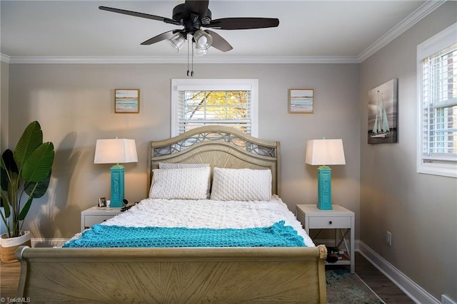 bedroom featuring ceiling fan, dark hardwood / wood-style flooring, and crown molding