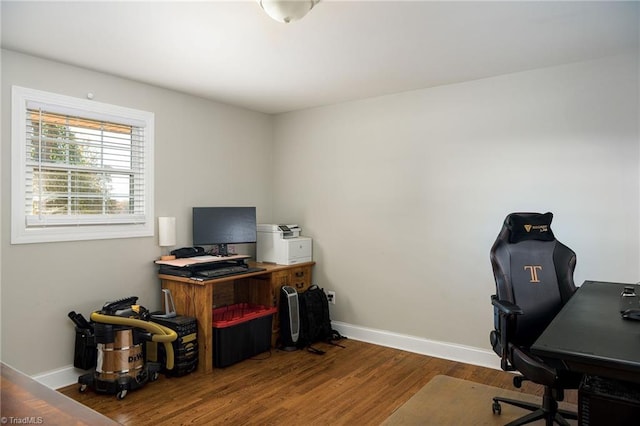 office space with hardwood / wood-style flooring