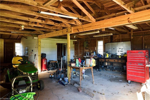 garage with a workshop area