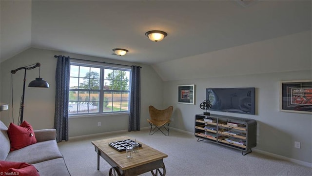 living room with vaulted ceiling and light carpet