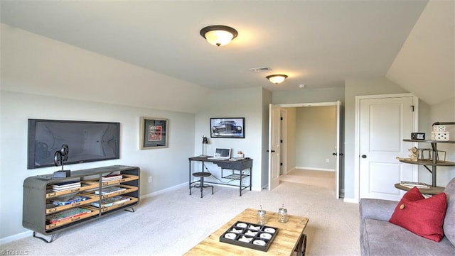 living room with lofted ceiling and carpet