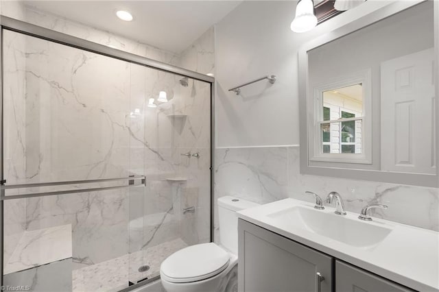 202 Aldridge Ln, Archdale, NC 27263 - full bathroom featuring toilet, a marble finish shower, tile walls, and vanity