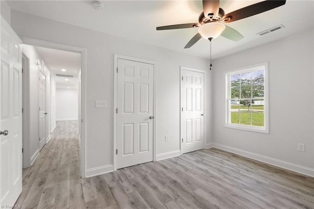 202 Aldridge Ln, Archdale, NC 27263 - unfurnished bedroom featuring light wood-type flooring, baseboards, a ceiling fan, and recessed lighting