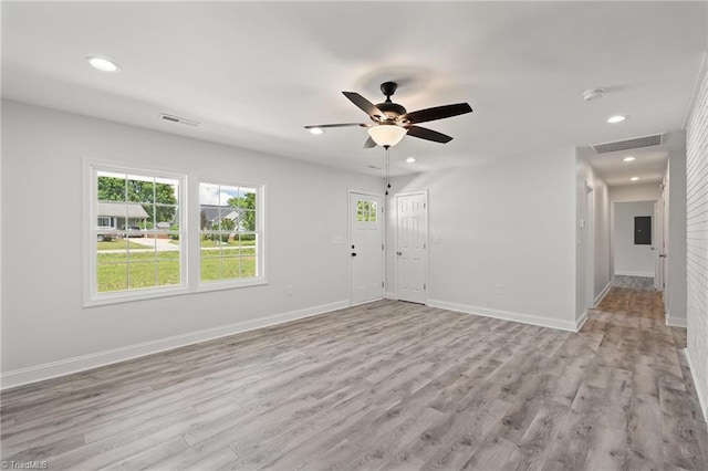 202 Aldridge Ln, Archdale, NC 27263 - unfurnished living room featuring a ceiling fan, light wood-style floors, baseboards, recessed lighting, and electric panel