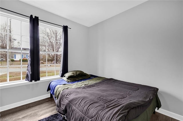 3304 Spring St, Greensboro, NC 27405 - bedroom with wood finished floors and baseboards
