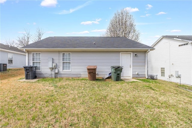 3304 Spring St, Greensboro, NC 27405 - back of house with a yard and central AC