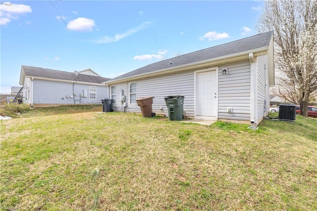 3304 Spring St, Greensboro, NC 27405 - rear view of house featuring a yard and central AC