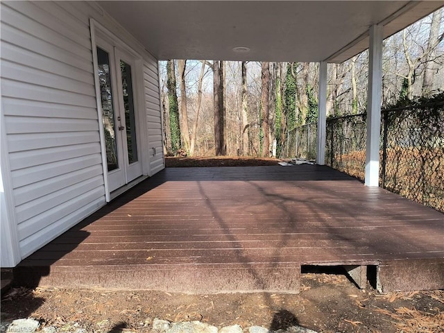 wooden deck featuring french doors