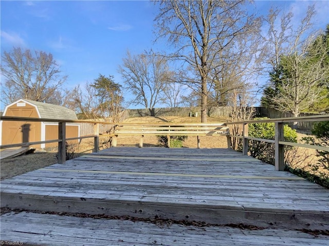 wooden deck with a storage unit